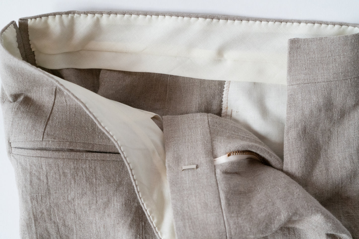 Tailored linen pants, waistband close-up