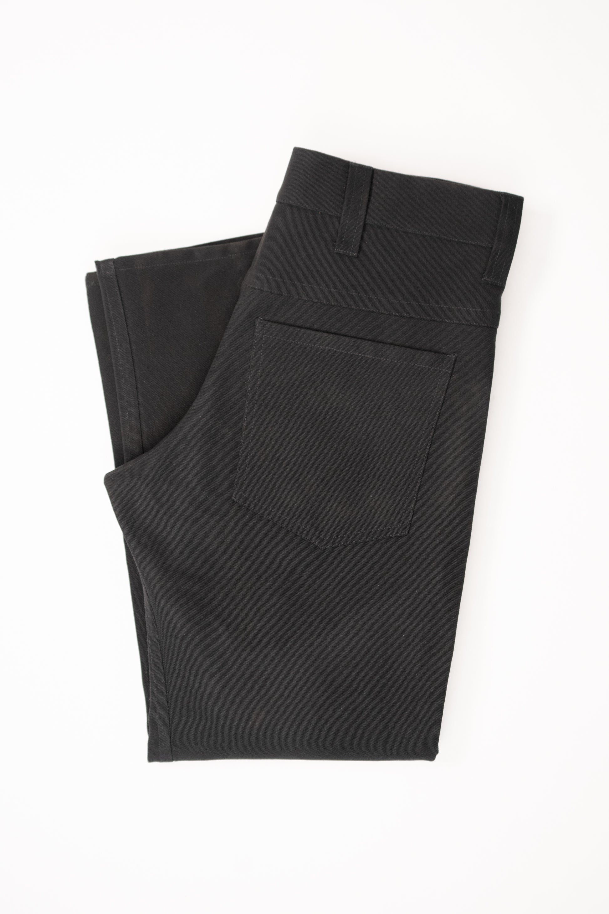 Black cotton canvas jeans, flat fold view