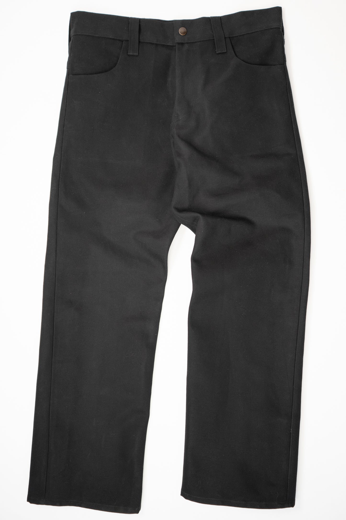 Black cotton canvas jeans, flat front view