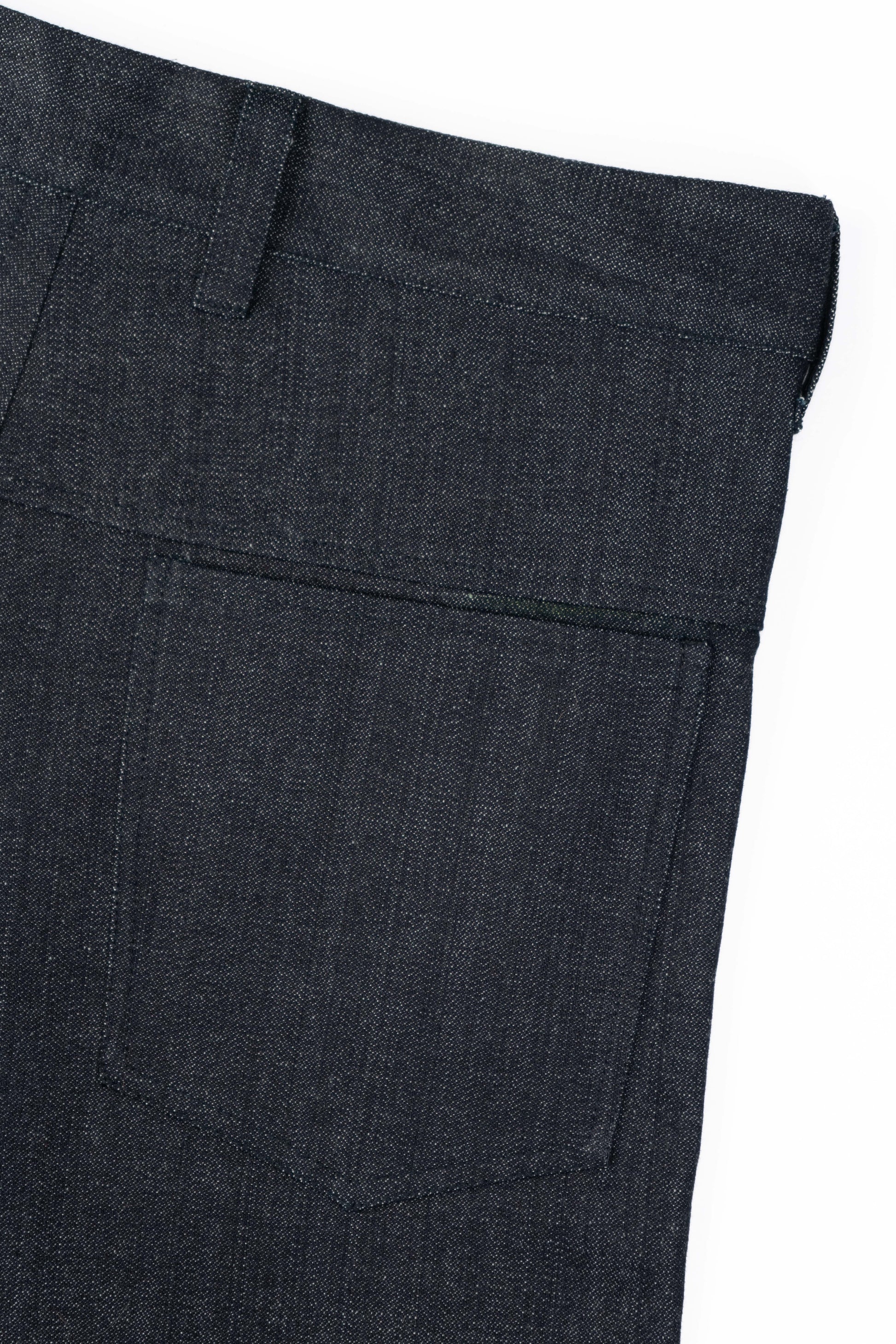 Dark indigo denim flat back close-up