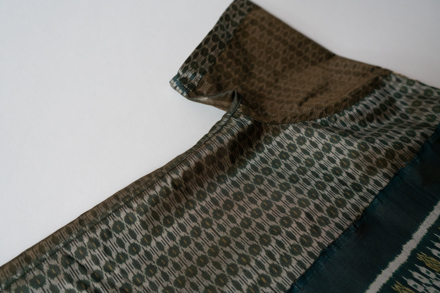 Green Cambodian silk button down, inside sleeve view